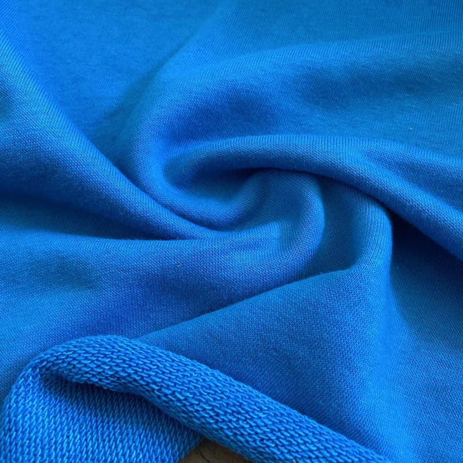 Yusuf Uçar Örme Kumaş two-thread fabric showing its face and reverse